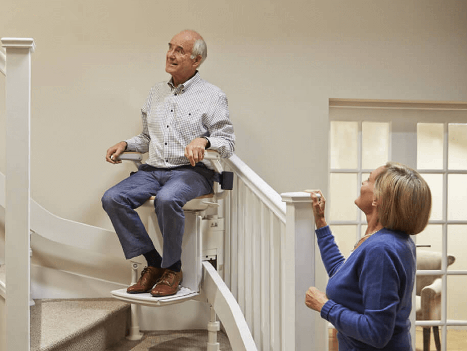 Old Man testing out new stairlift from AMS Group Ltd